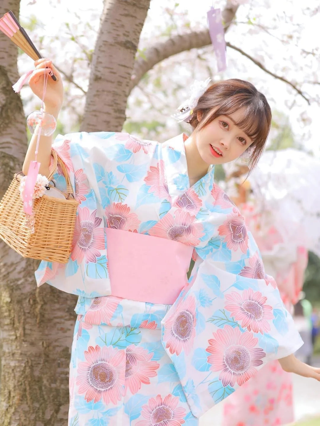 japanese girl wearing pink and blue kimono