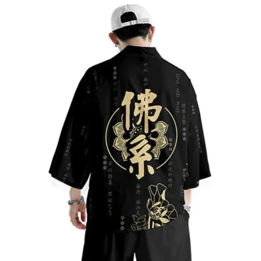 man wearing black and gold kimono jacket