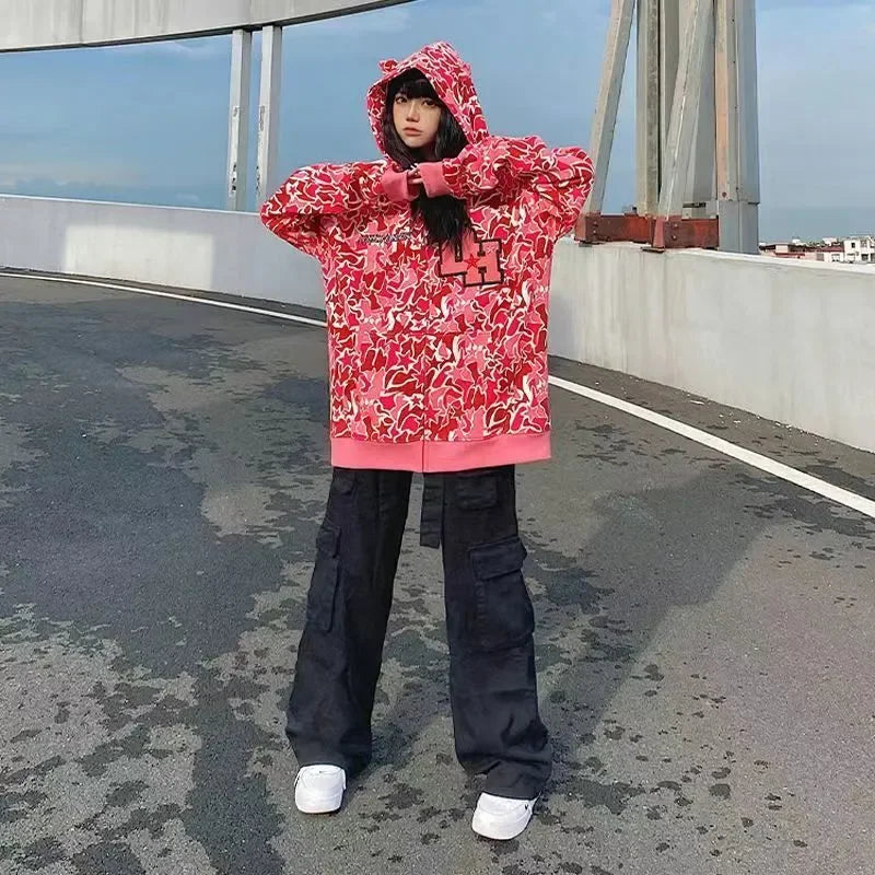 japanese woman wearing a dark harvest hoodie pink