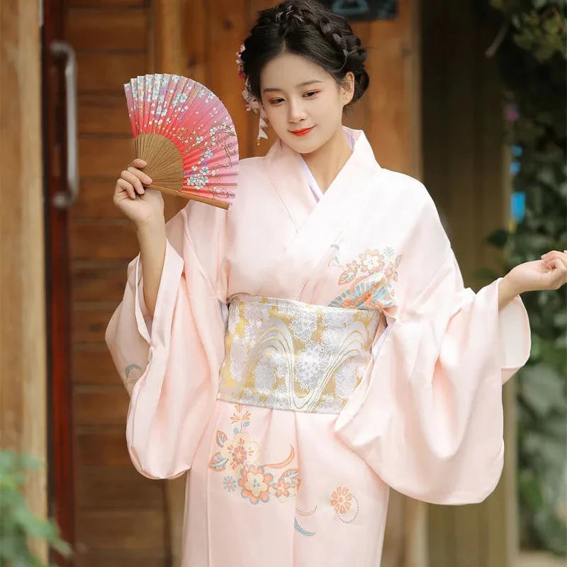 woman wearing light pink kimono