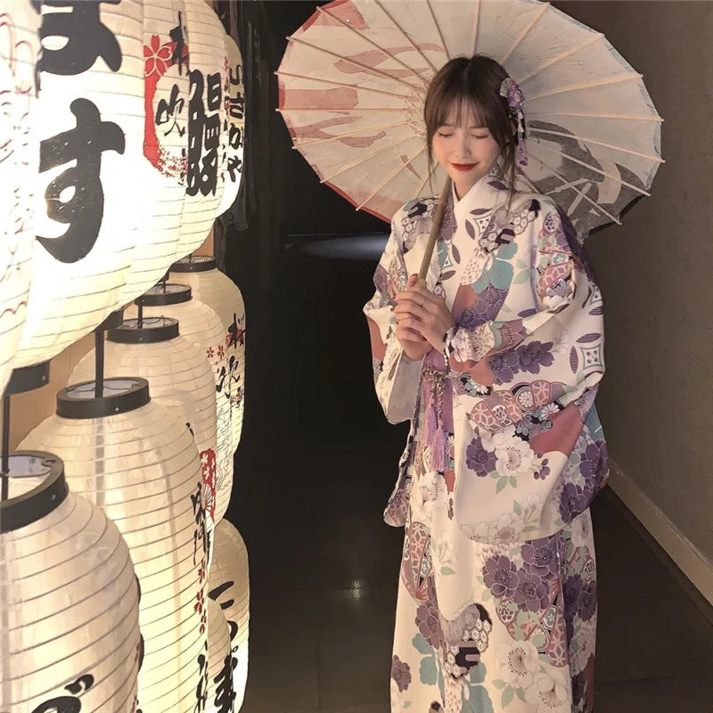 happy woman with a purple floral kimono