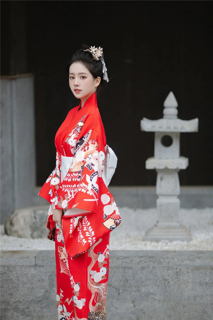 happy woman with a japanese kimono robe red