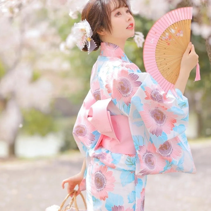 woman wearing pink and blue kimono