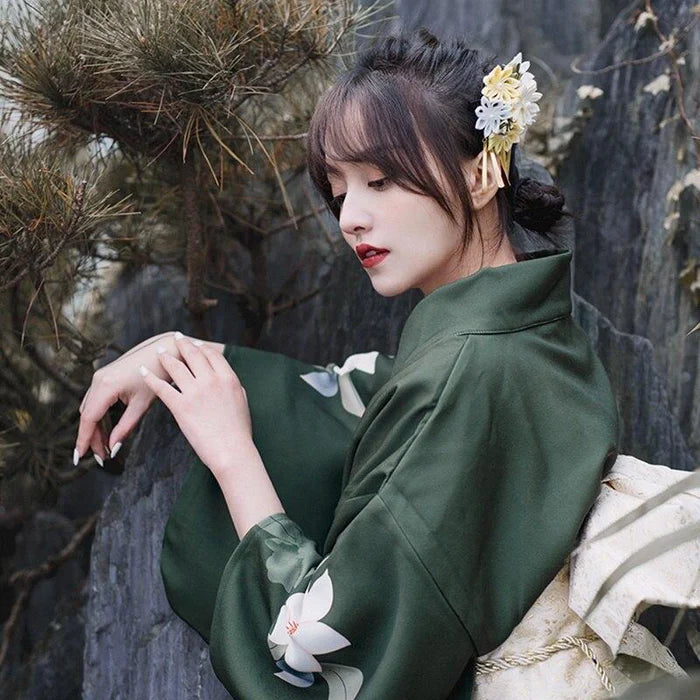 japanese woman wearing green japanese kimono dress