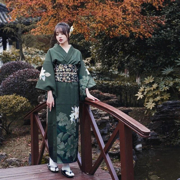 happy woman with green kimono dress