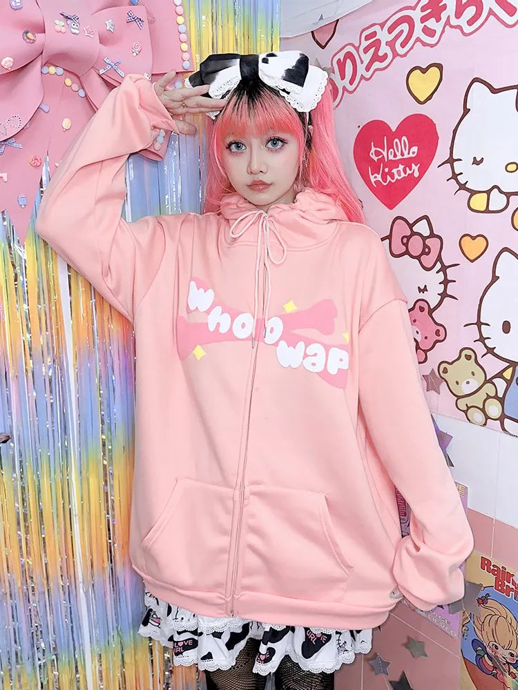 woman wearing pink kawaii zip up hoodie