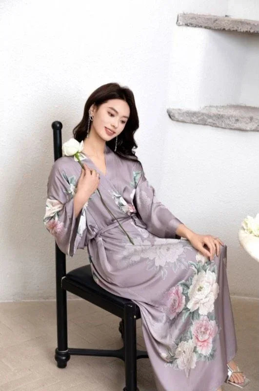 sitted woman with a purple japanese winter pajamas