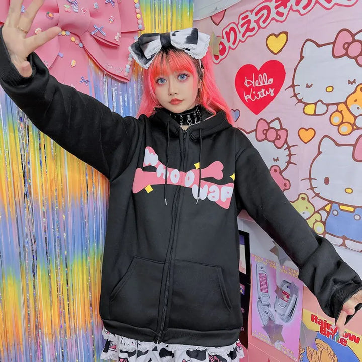 woman wearing black kawaii zip up hoodie